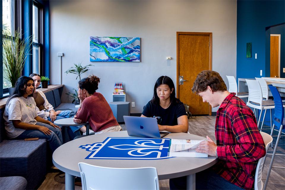 A group of students studying and decompressing in the wellness space